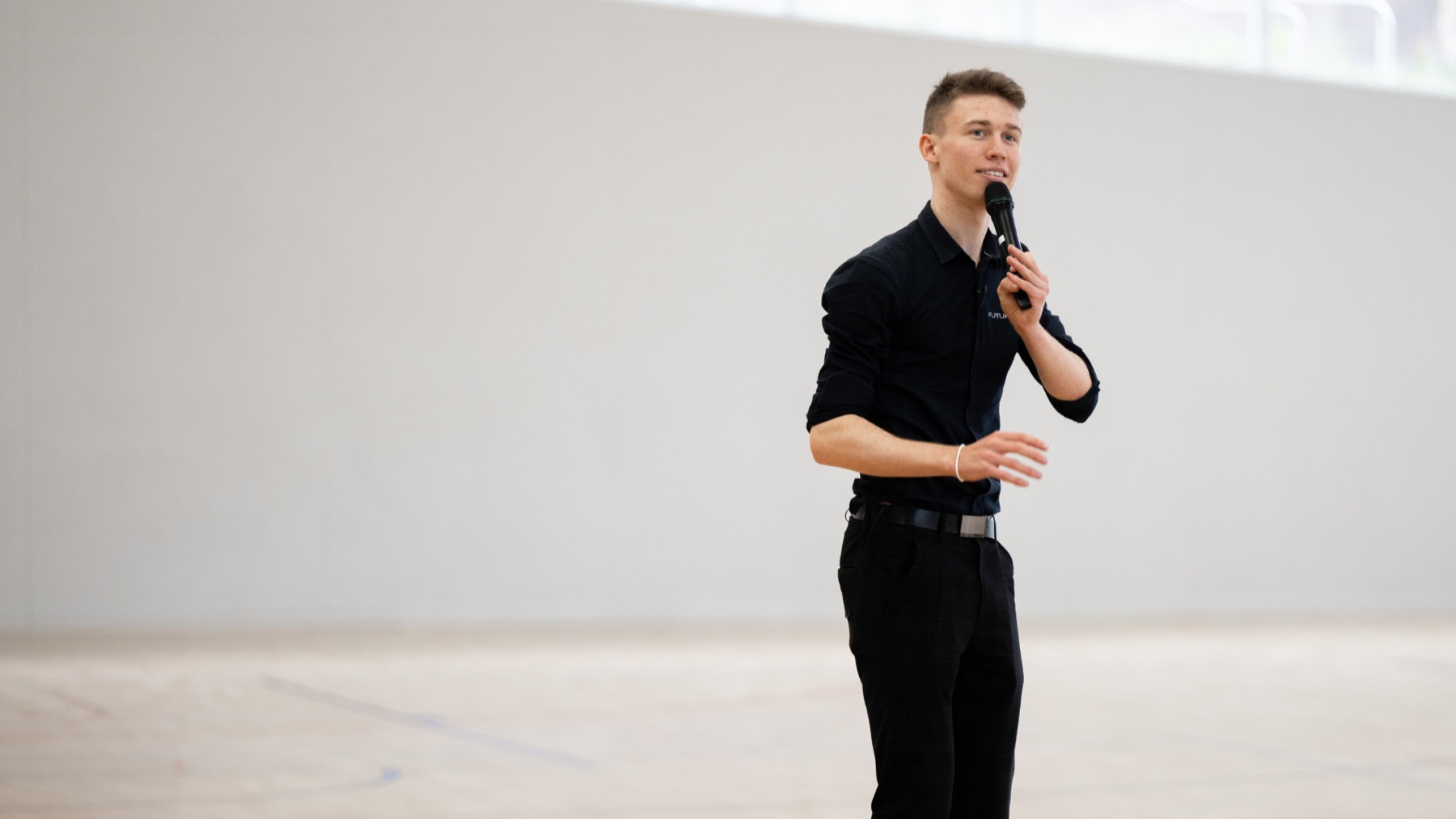 Isaac Busch speaking to an audience
